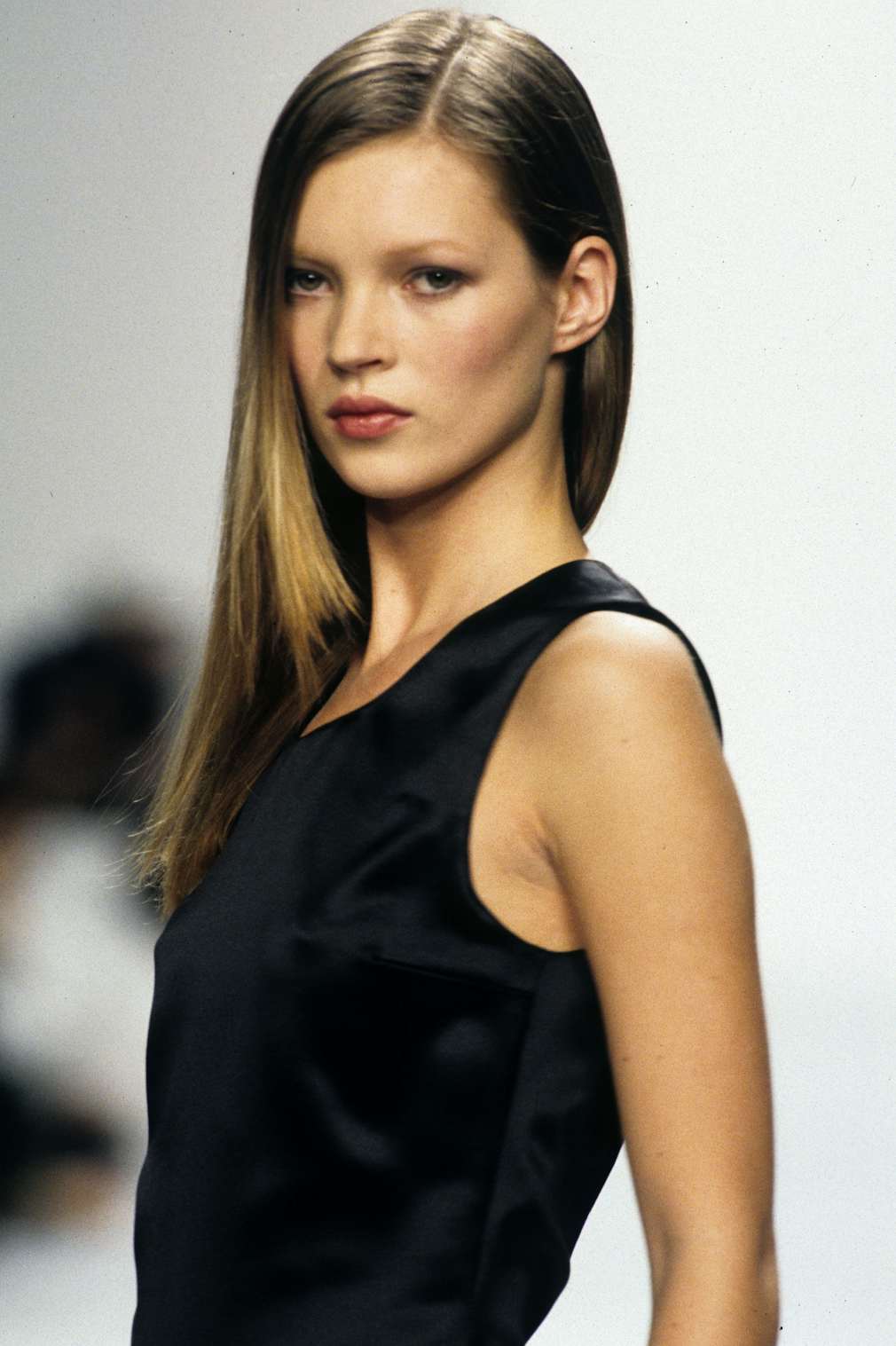 A model appears on stage during the Versace Menswear Spring 1998 News  Photo - Getty Images